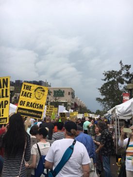 Protesters marching downtown through the Farmers Market on Saturday. Photo by Magdalene Taylor. 