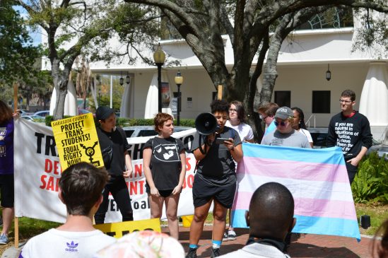 Third-year students Annie Rosenblum (center left) and Lorraine Cruz (center right) at a March for transgender rights in Downtown Sarasota.
