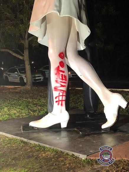 #MeToo spray painted on Unconditional Surrender statue